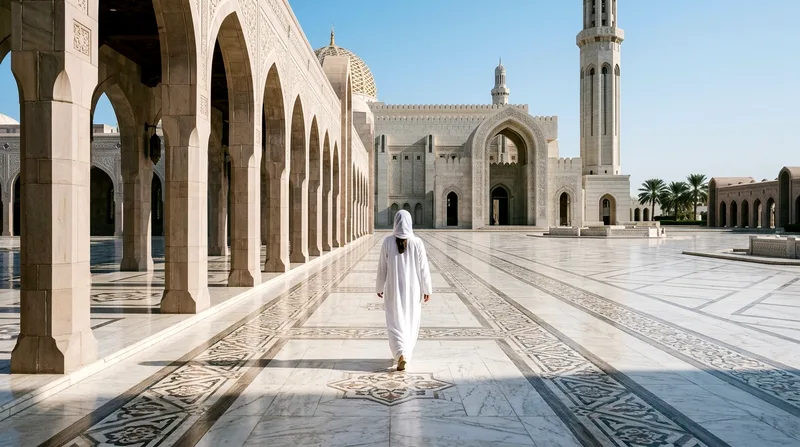 Woman in borrowed abaya in Sheikh Zayed Grand Mosque courtyard