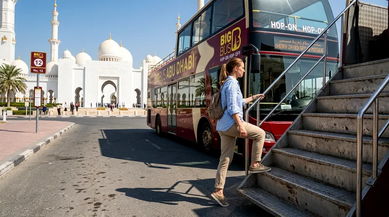 Passenger boarding hop-on hop-off bus at stop near Sheikh Zayed Grand Mosque.